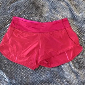 Pinkish red Lululemon Speed Up shorts